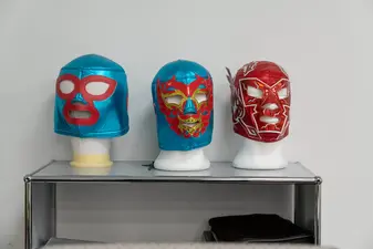 Drei Masken von Luchadores